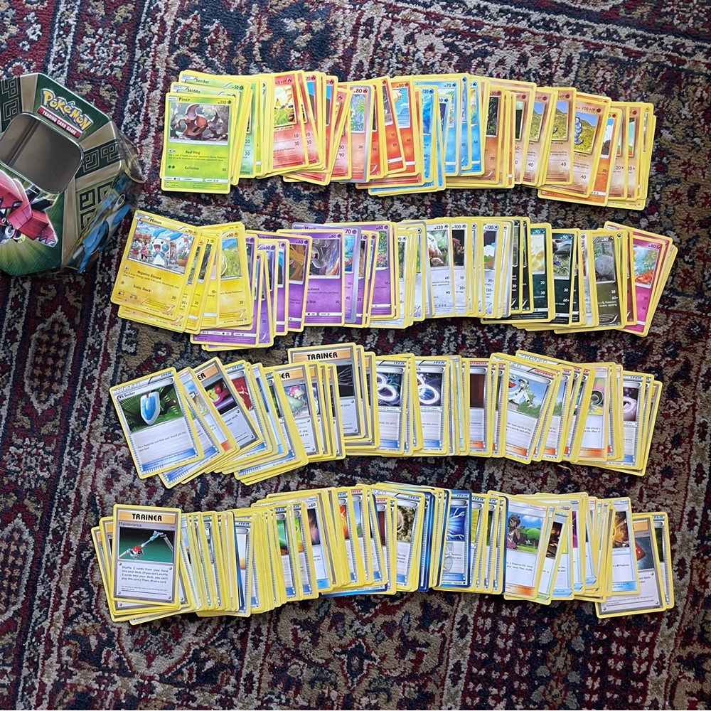 Pokemon Cards lot with metal can
